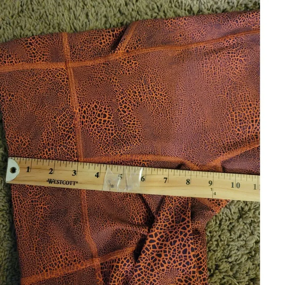 Lululemon Invigorate High-Rise Tight 25” in Crackle Orange, sz 6